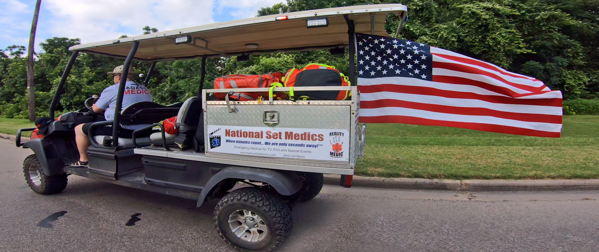 National Set Medics custom golf cart with American flag and medical supplies