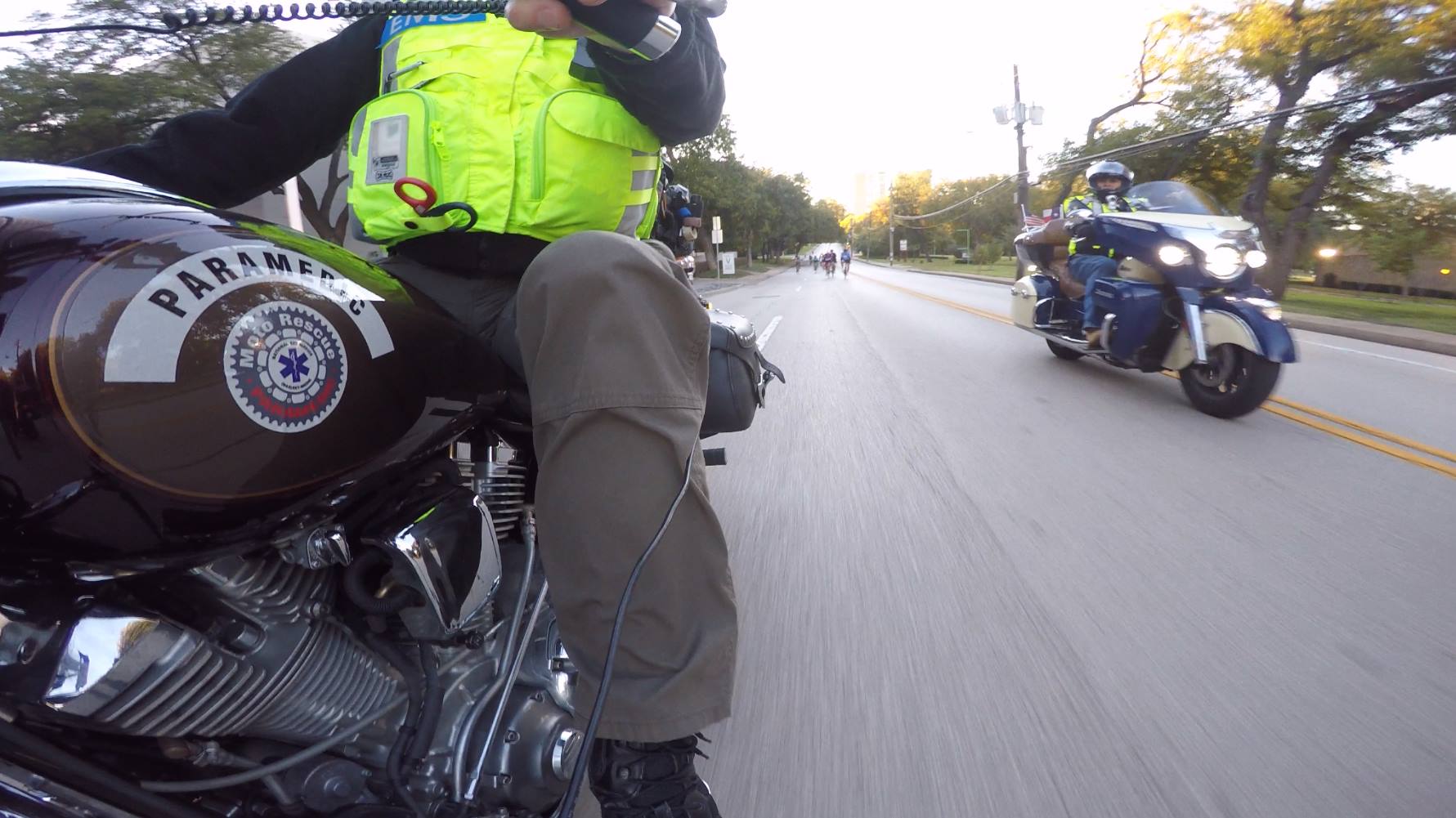 Paramedic on motorcycle quick-response unit at a live event